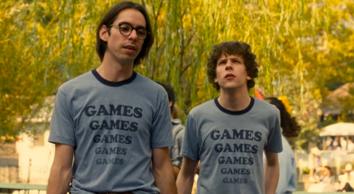 a couple of men standing next to each other