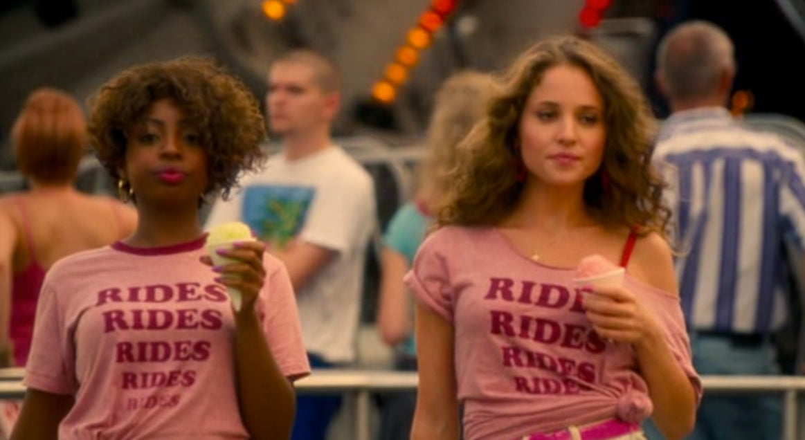 a couple of women standing next to each other