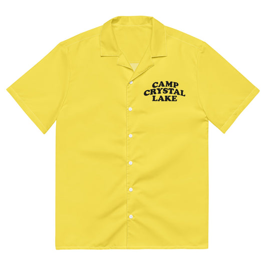 A tourist yellow unisex button up costume shirt with short sleeves and a collor that says "Camp Crystal Lake" and has white buttons. References the movie __________.