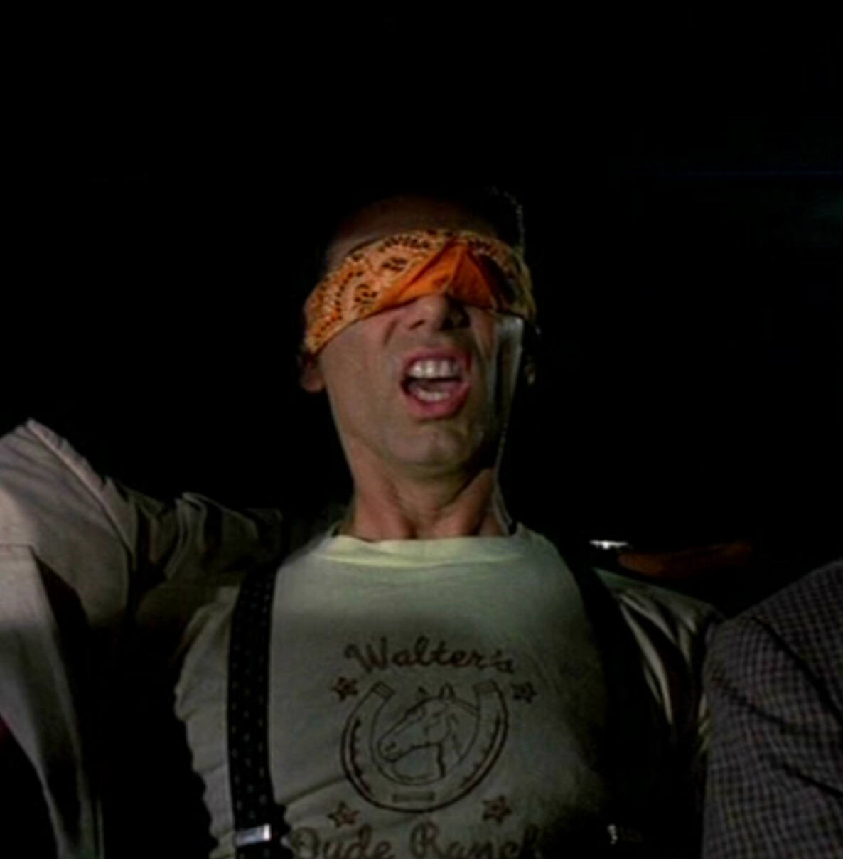 a man with a blindfold on his head