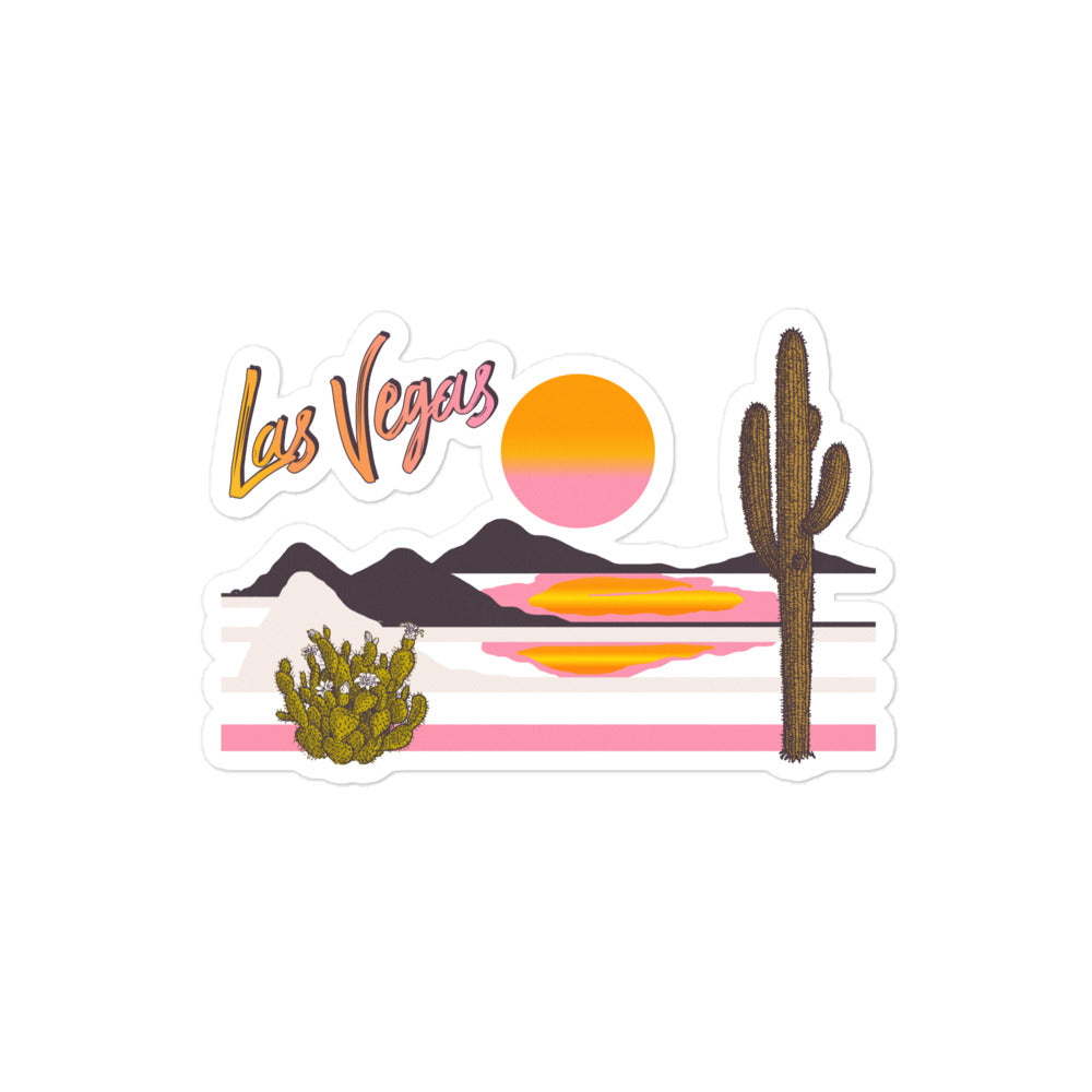 retro tourist style sticker with pink yellow green desert landscape drawing and las vegas in text