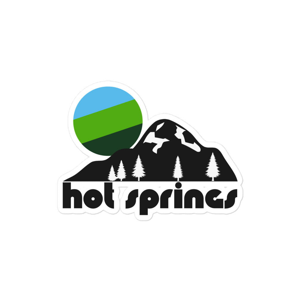 A retro Hot Springs kiss cut sticker with the image of a mountain landscape, pine trees, and a green and blue sun. References Hot Springs National Park in Arkansas, famous for its hot springs, trails, and Bathhouse Row.