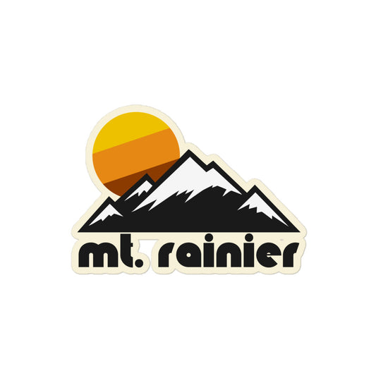 A retro kiss cut sticker that says "mt. rainier" under the image of multiple mountain peaks, covered in white snow, as a yellow, orange, and brown sun sets in the difference. References Mt. Rainier National park in Washington, near Seattle.