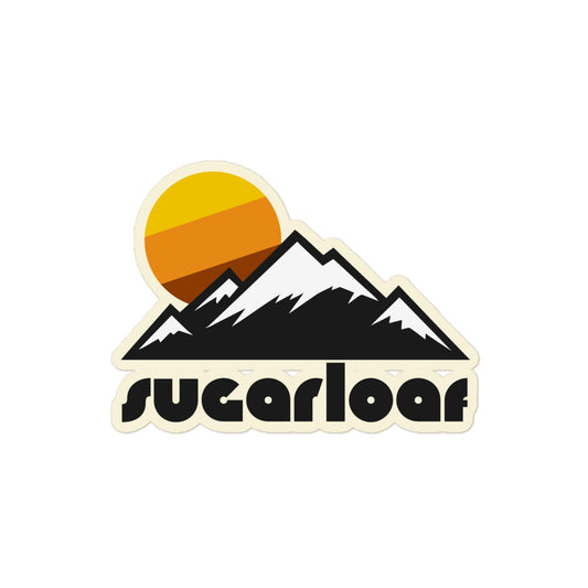 A retro, souvenir kiss cut sticker that says "Sugarloaf" under the image of five mountain peaks, covered in snow, underneath a picturesque tricolored sun. References Sugarloaf Resort in Carrabassett Valley, Maine, and the Sugarloaf Mountain, a registered natural landmark.