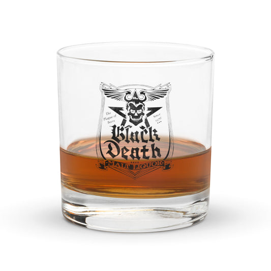 A vintage 10.5 oz rocks glass from Black Death Malt Liquor. Says "The Plague of Beers" and "Since 1976." Image of skull with crown and wings over a five pointed devil star. A fictional alcohol from the TV show WKRP in Cincinnati.