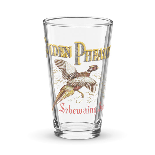 A retro shaker pint glass that says Golden Pheasant and Sebewaing Beer. Image of golden pheasant flying through the air, the Michigan brewing company's logo.