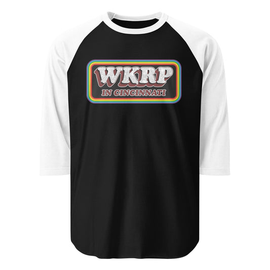 A vintage raglan style three quarter sleeve black and white WKRP in Cincinnati shirt from the sitcom TV show that ran in the 70s and 80s surrounded by rectangular rainbow lines.