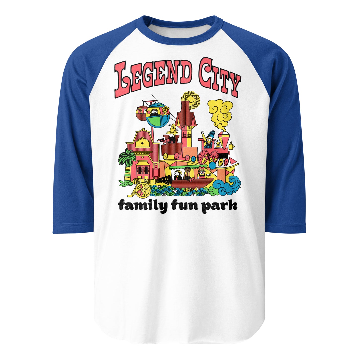 A tourist blue and white three quarter sleeve raglan shirt that says "Legend City family fun park" with images of children riding trains, skyway gondolas, boats and more in the Arizona amusement park. Images of a smiling sun, a cannon with the word "boom", a palm tree, and family friendly cute buildings.