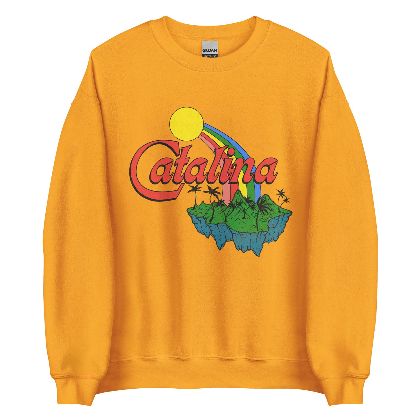 A gold colored retro crew neck sweatshirt that says "Catalina". Image of sunshine, rainbow, and green island with palm trees and mountains.