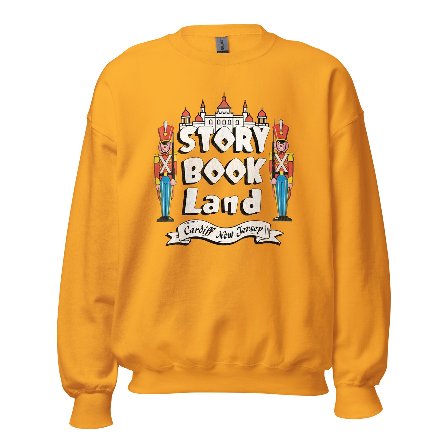 A tourist orange crew neck sweatshirt that says Story Book Land and Cardiff New Jersey with toy soldiers that look like the Nutcracker and a palace image referencing the family amusement park in Egg Harbor Township.
