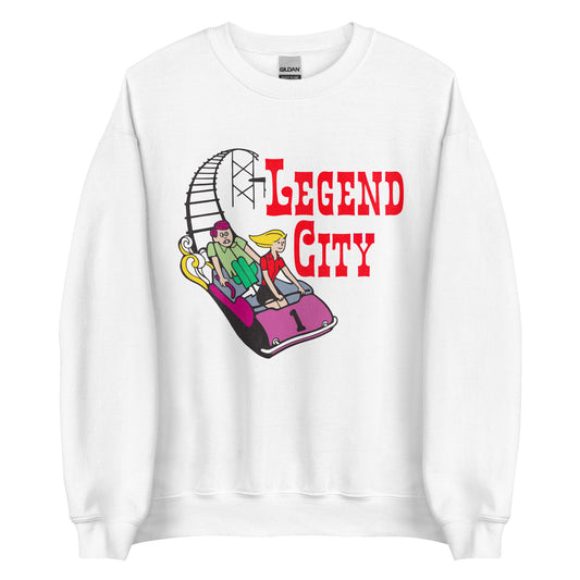 A white vintage crew neck sweatshirt that says "Legend City" in reference to the Arizona 1960s - 1980s family theme park near Tempe and Pheonix. Image of a boy in green and girl in red riding a bright pink rollercoaster car with the number 1 over black rollercoaster tracks.