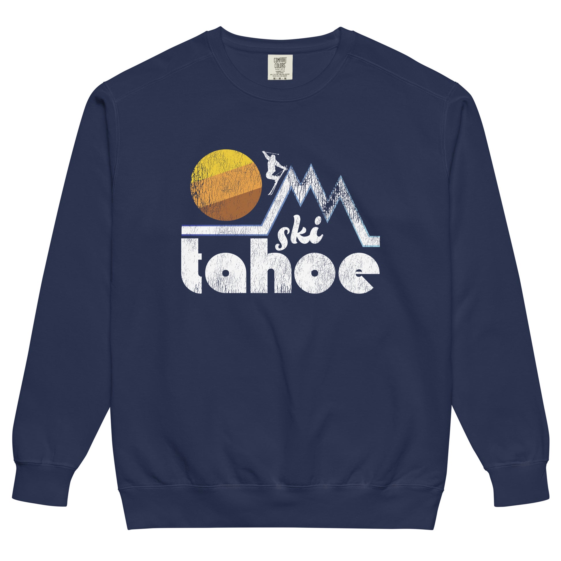 A souvenir vintage Ski Tahoe navy blue crew neck sweatshirt with the image of a large tricolored sun, a couple mountain peaks, and a skier. References Lake Tahoe, a popular ski and snowboard retreat area, home to Palisades Tahoe, Heavenly Ski Resort, and Sierra-at-Tahoe Resort among others.
