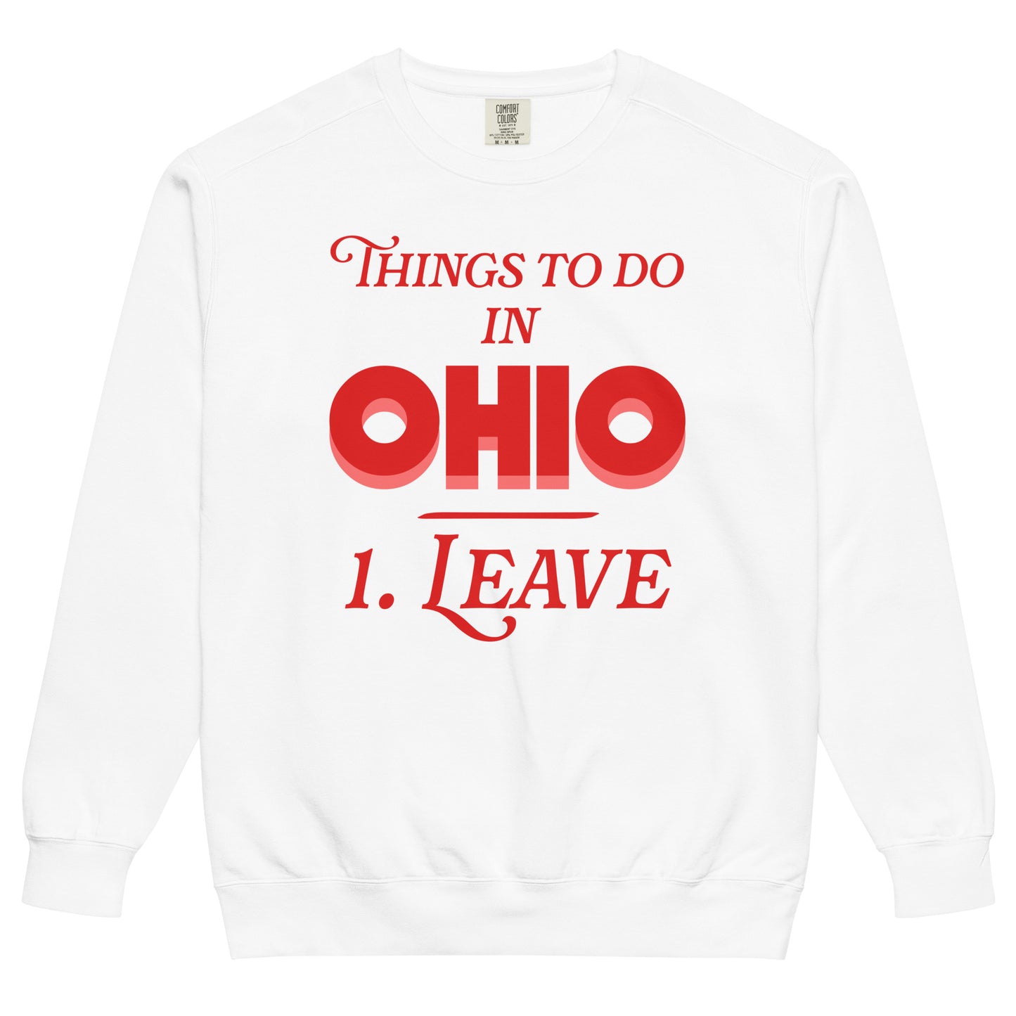A white colored vintage crew neck Ohio sweatshirt that makes fun of the state, stating "Things to Do in Ohio: 1. Leave", referencing various internet and social media memes that hate on the midwestern state in a joking way.
