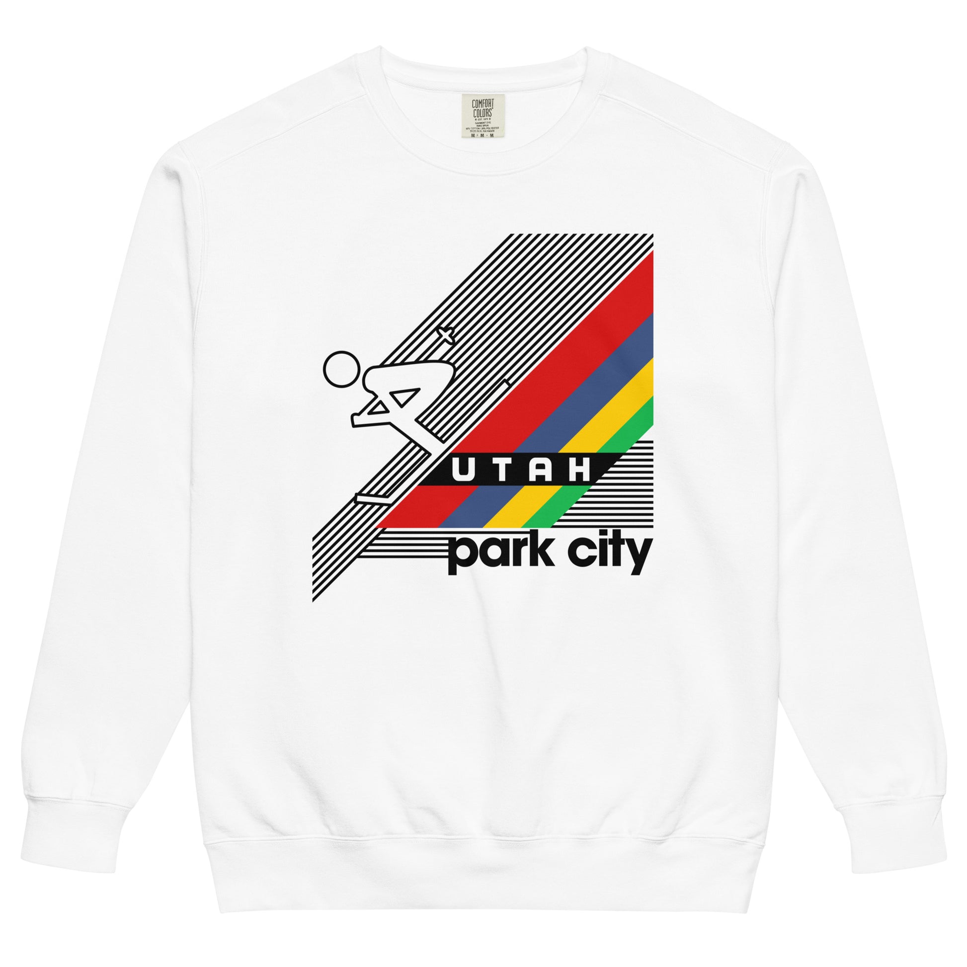 A retro 70s style white crew neck sweatshirt  with the image of a red, blue, yellow, and green striped mountain with a person skiing downwards. A city that includes multiple ski and snowboard resorts and the Utah Olympic Park built for the 2002 Salt Lake City Winter Olympic Games.