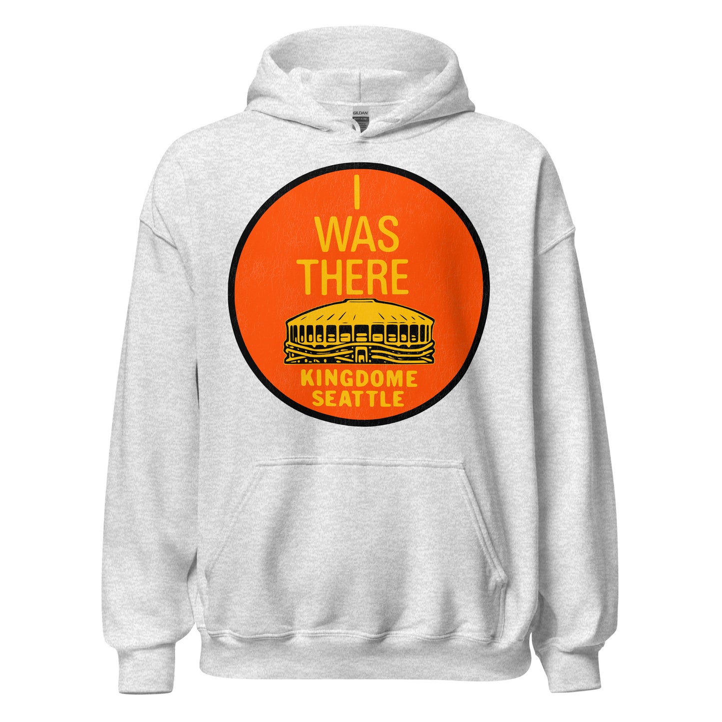 An ash gray retro tourist hooded sweatshirt that shows an image of the Kingdome from Seattle, also called King County Stadium, where the Seahawks, Mariners, and SuperSonics played. Text says "I Was There" on top of an orange circle, referencing the domed roof of the stadium which resembled an orange juicer. Was demolished to build Lumen Field.