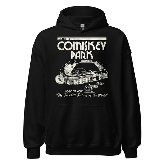 A black tourist vintage Comiskey Park hoodie sweatshirt that says "Home of Your White Sox" and "The Baseball Palace of the World" and was Established in 1919. References the Chicago South Side stadium where the White Sox played from 1910-1990. Image of a baseball diamond inside the stadium, named after owner Charles Comiskey, and a White Sox baseball player holding a bat.