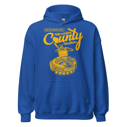 A 70s style retro royal blue Milwaukee County Stadium hooded sweatshirt with an image of the map of Wisconsin for the "O" in "County". Says "Home of your Milwaukee Brewers" in reference to the MLB baseball team and the stadium used from 1953-2000. Image of a Brewers player swinging a bat and the baseball stadium with five stars due to their "five star talent" in yellow and blue, the colors of the Brewers team.