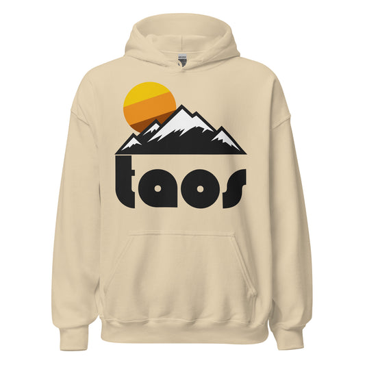 A 70s style souvenir "Taos" sand colored hooded sweatshirt including a mountain landscape and sunset image. In reference to Taos Ski Valley on Taos Mountain in the Sangre de Cristo range, which starts the Rockies, in New Mexico, known for its world class skiing and snowboarding runs.