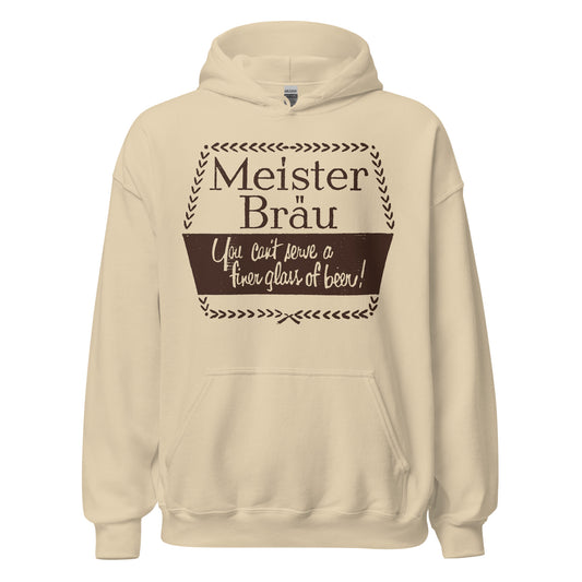 A sand colored 80s style retro hooded sweatshirt that says "Meister Bräu, You can't serve a finer glass of beer!" References the famous billboard ad from 1950 for Meister Brau Beer, originally brewed in the 1950s by the Peter Hand Brewing Company in Chicago which began in the 1890s. Now the brand is owned by Miller Brewing Company.