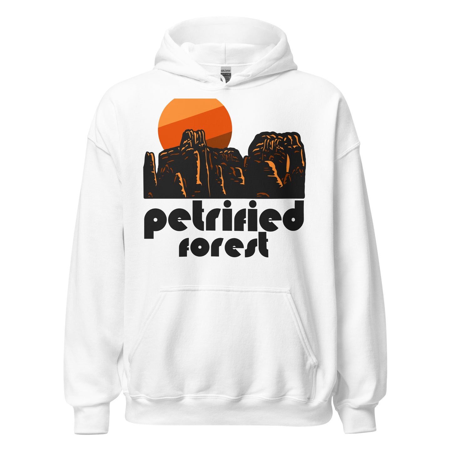 A white hooded sweatshirt that says "petrified forest" underneath the image of a desert, rock, and crevice landscape, a warm toned tricolored sun rising from the rocks. References the Petrified Forest Natinal Park in the Navajo and Apache counties of Arizona, famous for the Painted Desert Inn, Rainbow Forest, Puerco Pueblo, and especially for its large concentration of fossils from the Triassic Period.