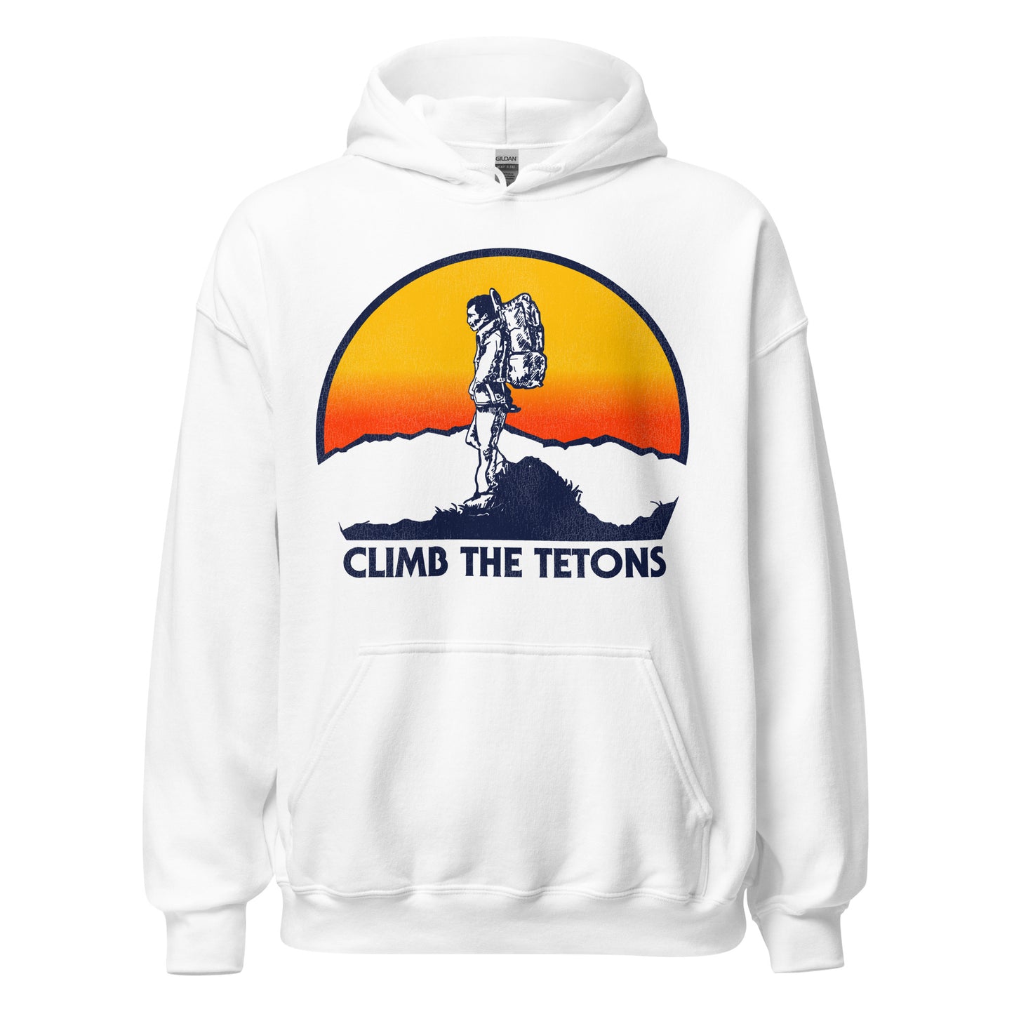 A white retro Grand Tetons hoodie sweatshirt with the words 'Climb the Tetons' and an image of a hiker on top of a mountain with clouds and a mountain range in the distance as the sun sets. Refers to the Grand Teton National Park, next to Yellowstone National Park, in Wyoming.