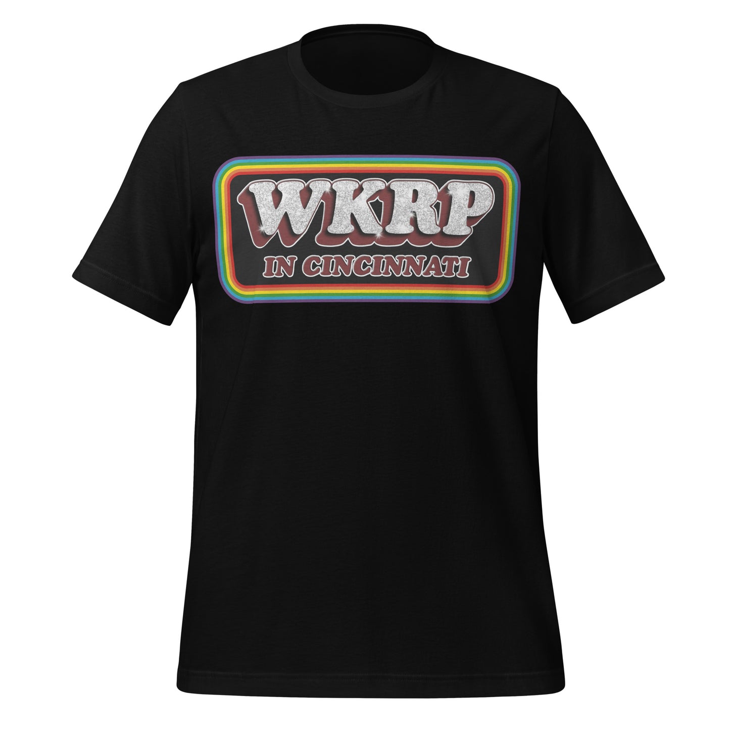 A retro black WKRP in Cincinnati t-shirt in reference to the 4 season sitcom TV series from the 1970s-1980s. Has rainbow lines surrounding the logo in a rectangle.