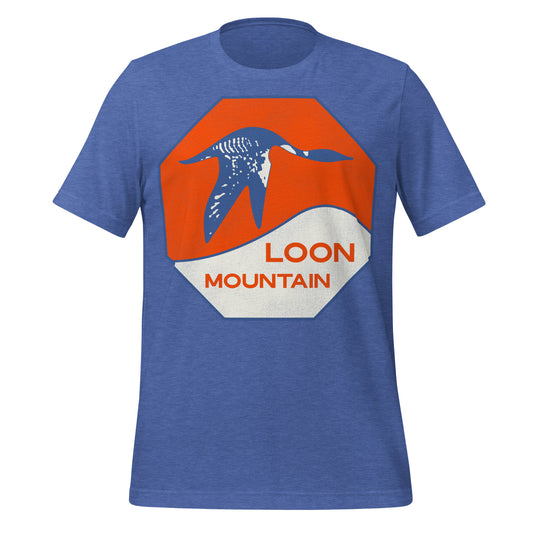 A heather true royal souvenir t-shirt from Loon Mountain, a ski and snowboard resort in New Hampshire. Image of a blue loon soaring across the White Mountain Range against an orange sunset.
