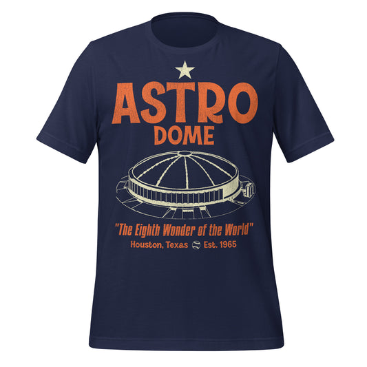A navy blue retro t-shirt that says "Astro Dome" from "Houston, Texas", "Est. 1965",  known as "The Eighth Wonder of the World" by Judge Roy Hofheinz. Image of the circular stadium with a domed ceiling and a small baseball. References the 70,000 seat park, which was built in 1965 as the first ever domed stadium and was the home of the Houston Astros MLB team and the Houston Oilers NFL team.