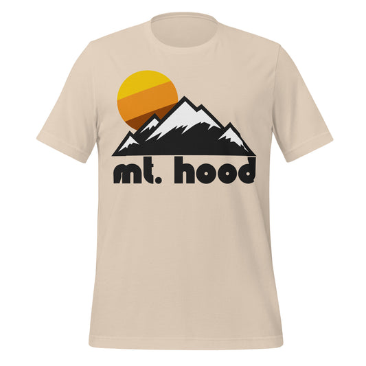 A soft cream colored vintage t-shirt that says "Mt. Hood" and includes the image of a mountain range (representing the Cascades) and a yellow/orange/brown sun rising above the peaks. References Mount Hood Meadows, a popular, family friendly ski resort on Mount Hood, with stunning ski and snowboard runs, beautiful views, and heavy snowfall.