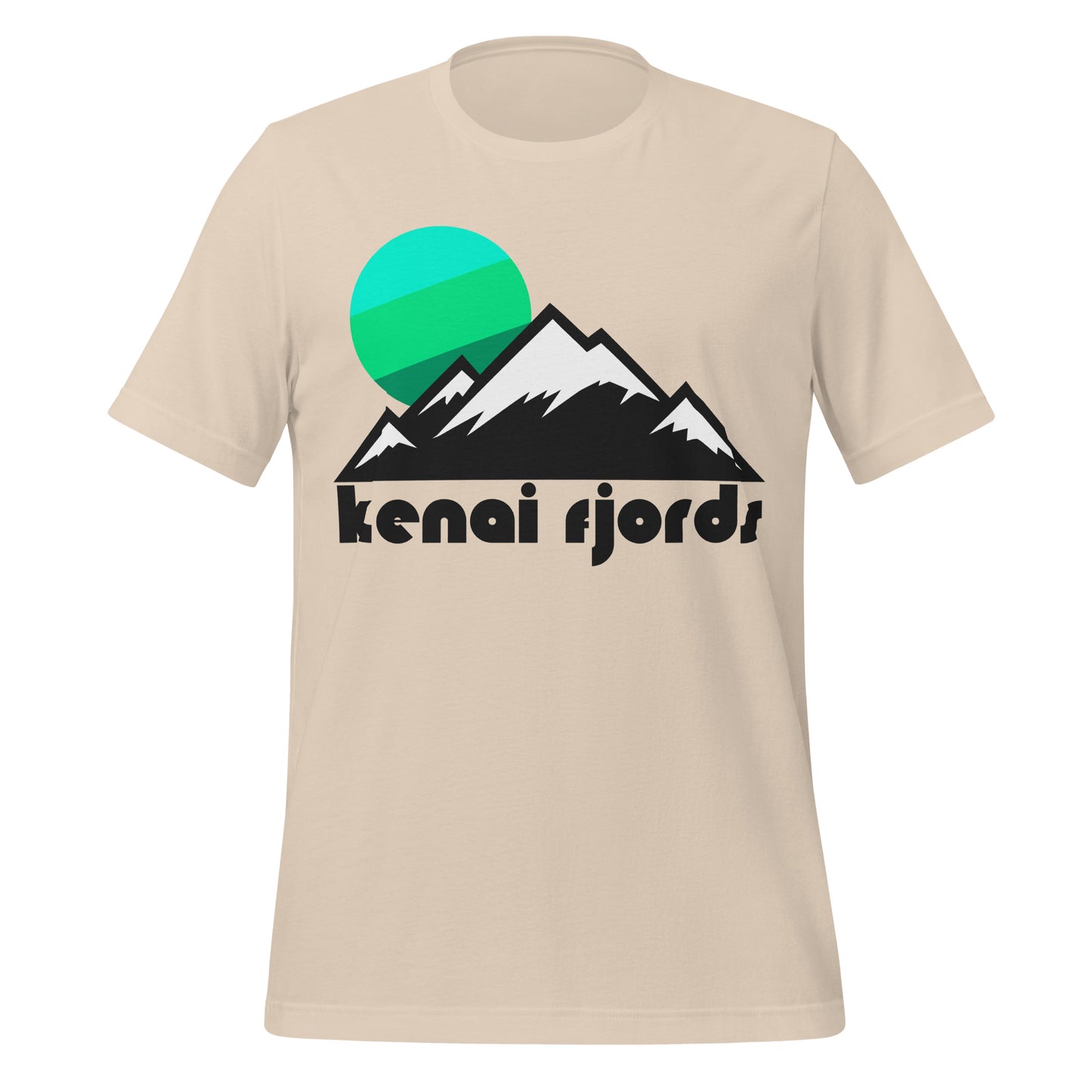 A soft cream colored retro t-shirt that says 'kenai fjords' under the image of a beautiful snow peaked mountain range and an aqua blue, lime green, and forest green rising sun. References Alaska's famous Kenai Fjords National Park in the Kenai Mountains, known for its almost 40 glaciers coming from the Harding Icefield and location right on the coast of the Pacific Ocean.