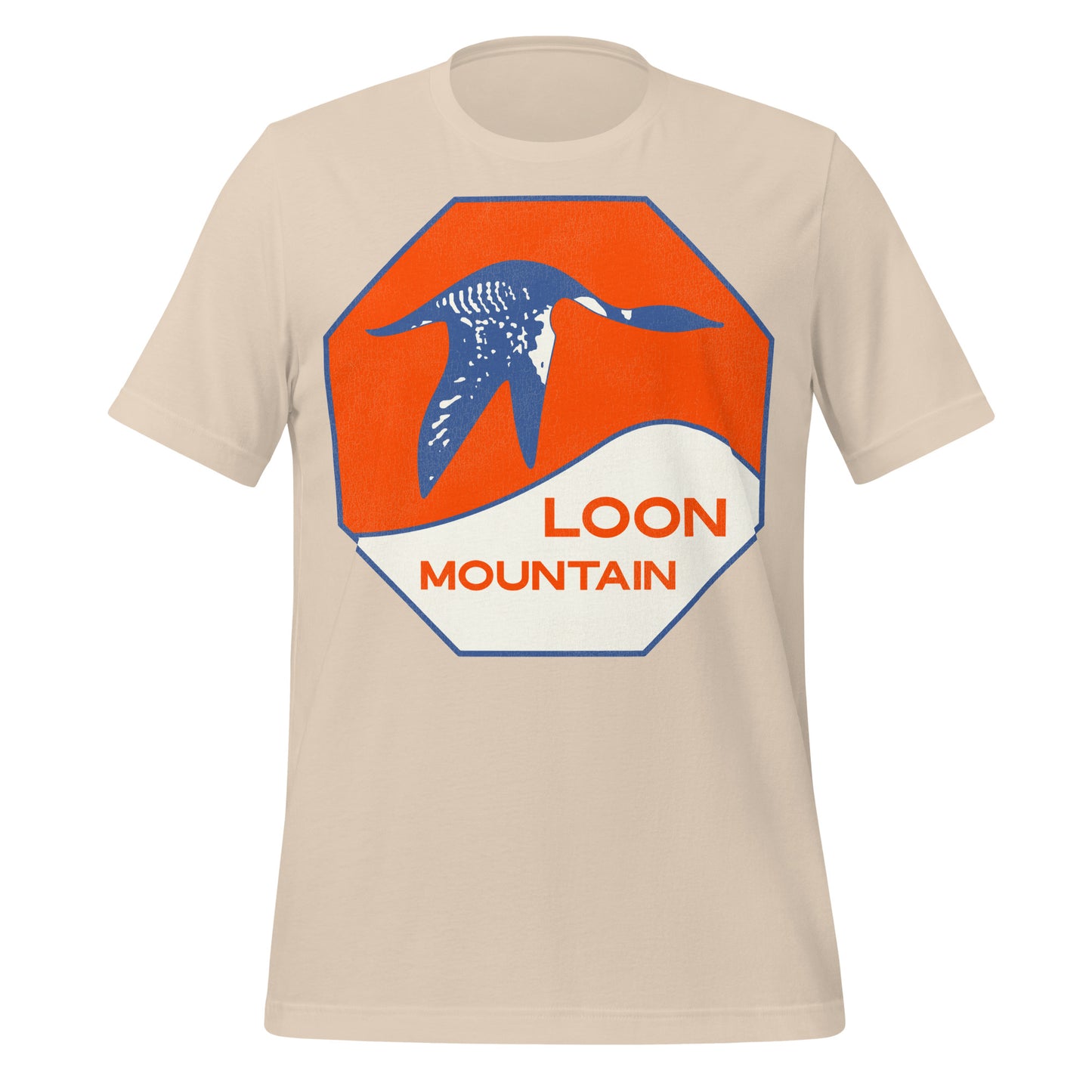 A soft cream short sleeve travel t-shirt that says Loon Mountain. Orange sunset with a blue colored loon flying over the New Hampshire White Mountain Range for skiing and snowboarding.