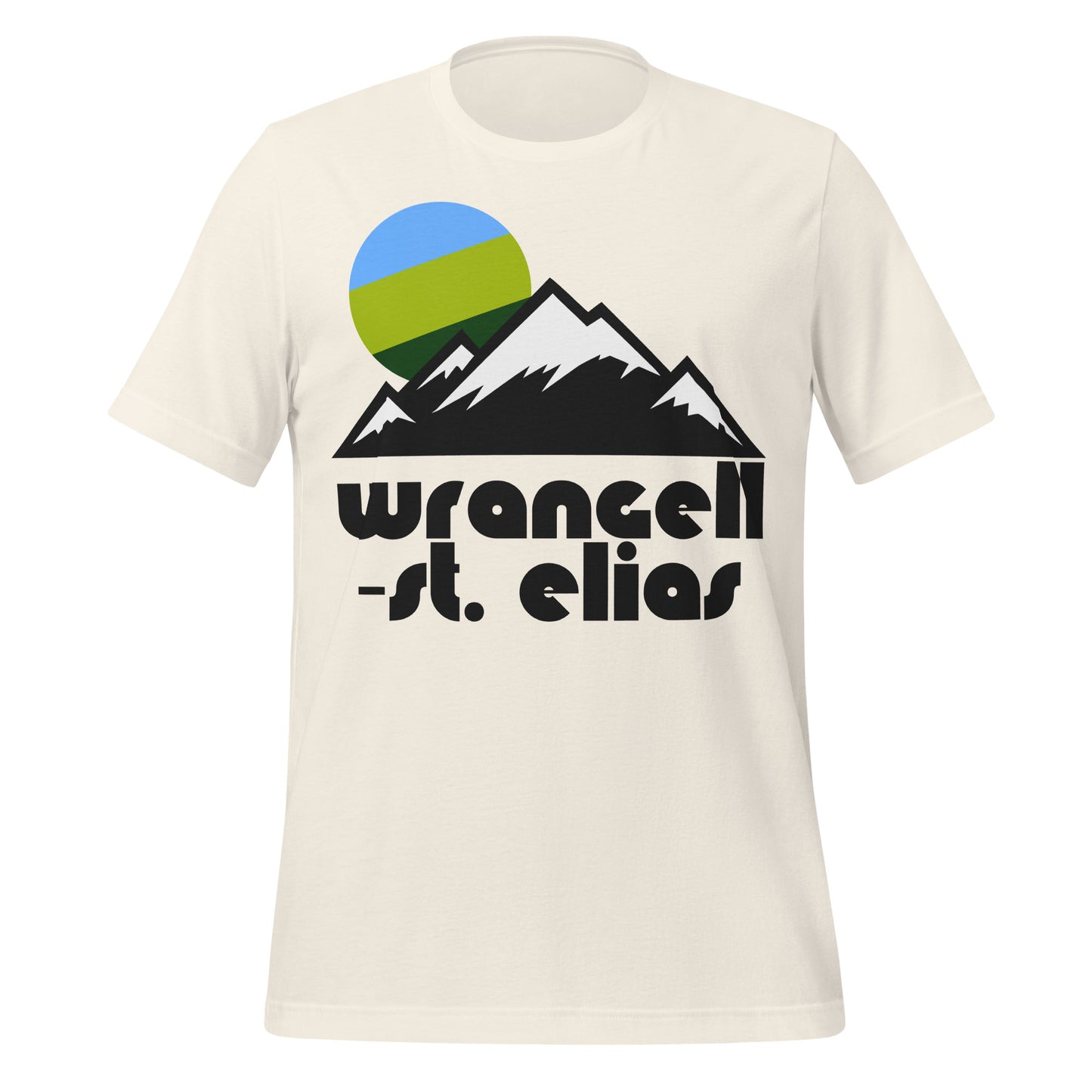 A retro vintage white colored 70s style t-shirt with the image of snow covered mountain peaks and a blue and green sun. Says "Wrangell-St. Elias", the largest national park in the United States, located in Alaska, including the famous Hubbard Glacier, 9 out of 16 of the tallest mountain peaks in the US, and volcanoes such as Mt. Wrangell.