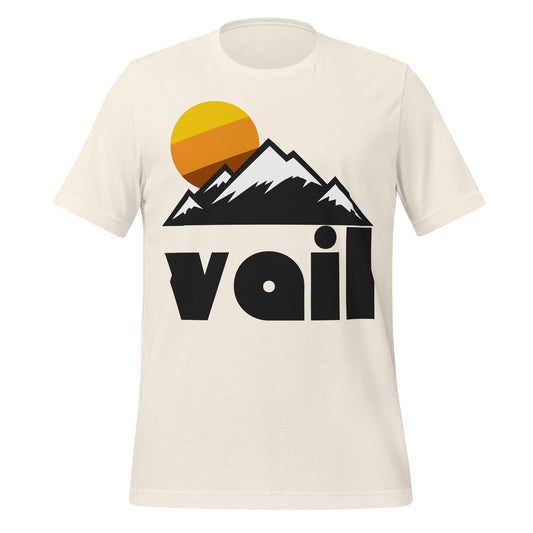 A vintage white souvenir Vail, CO t-shirt with a mountain range landscape and snowy peaks and a circular sun in the backdrop. The town is known for its Vail Ski Resort, and hiking/backpacking trails and destinations like Gore Creek.