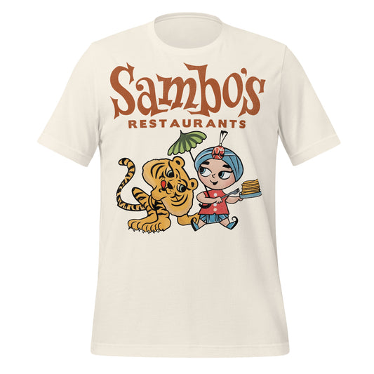 A vintage off-white retro t-shirt that says "Sambo's Restaurants" with a child eating pancakes and Sambo's tiger beside referencing the restaurant chain from 1950s-1980s.