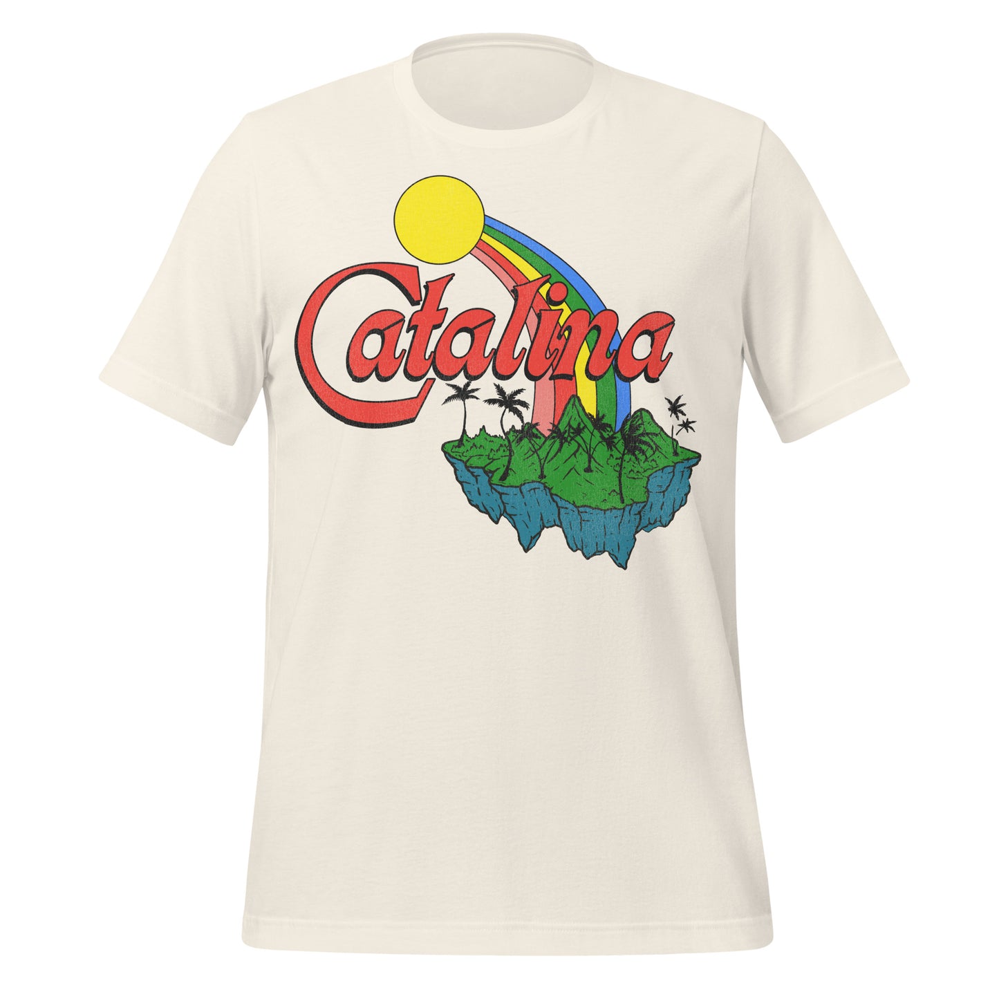 A 60s off white colored t-shirt that says "Catalina" in red block letters. Image of yellow sun shining a rainbow down to an island covered in green mountains and palm trees. References Catalina Island in California, a popular tourist destination.