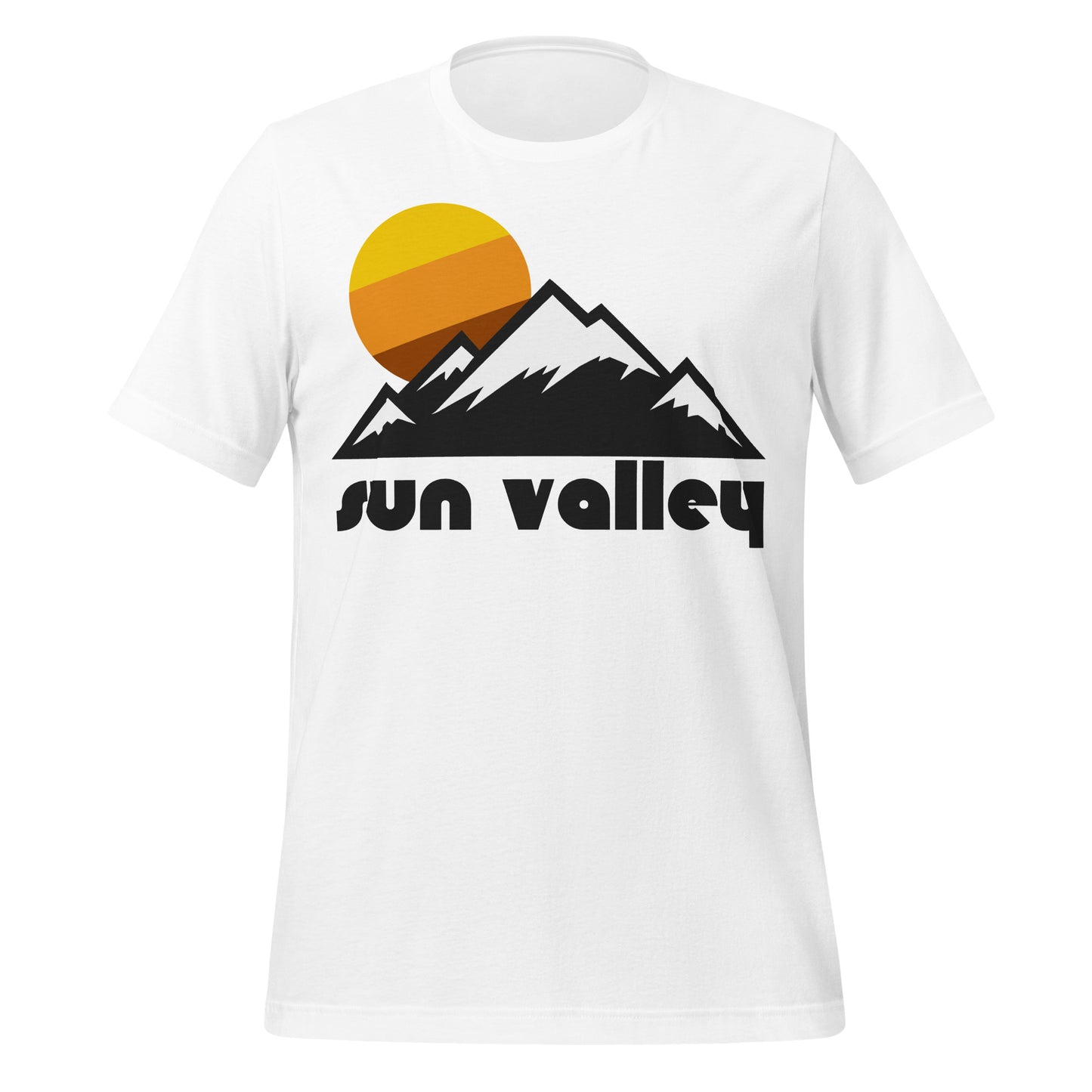 A white, retro style t-shirt with the words "Sun Valley" and multiple mountains with snowy peaks and a tricolored sun in the distance. References the Sun Valley Resort, a ski resort in Idaho that includes access to Bald Mountain and Dollar Mountain in the Northern Rocky Mountains, specifically near the Pioneer Mountains and the Smoky Mountains.