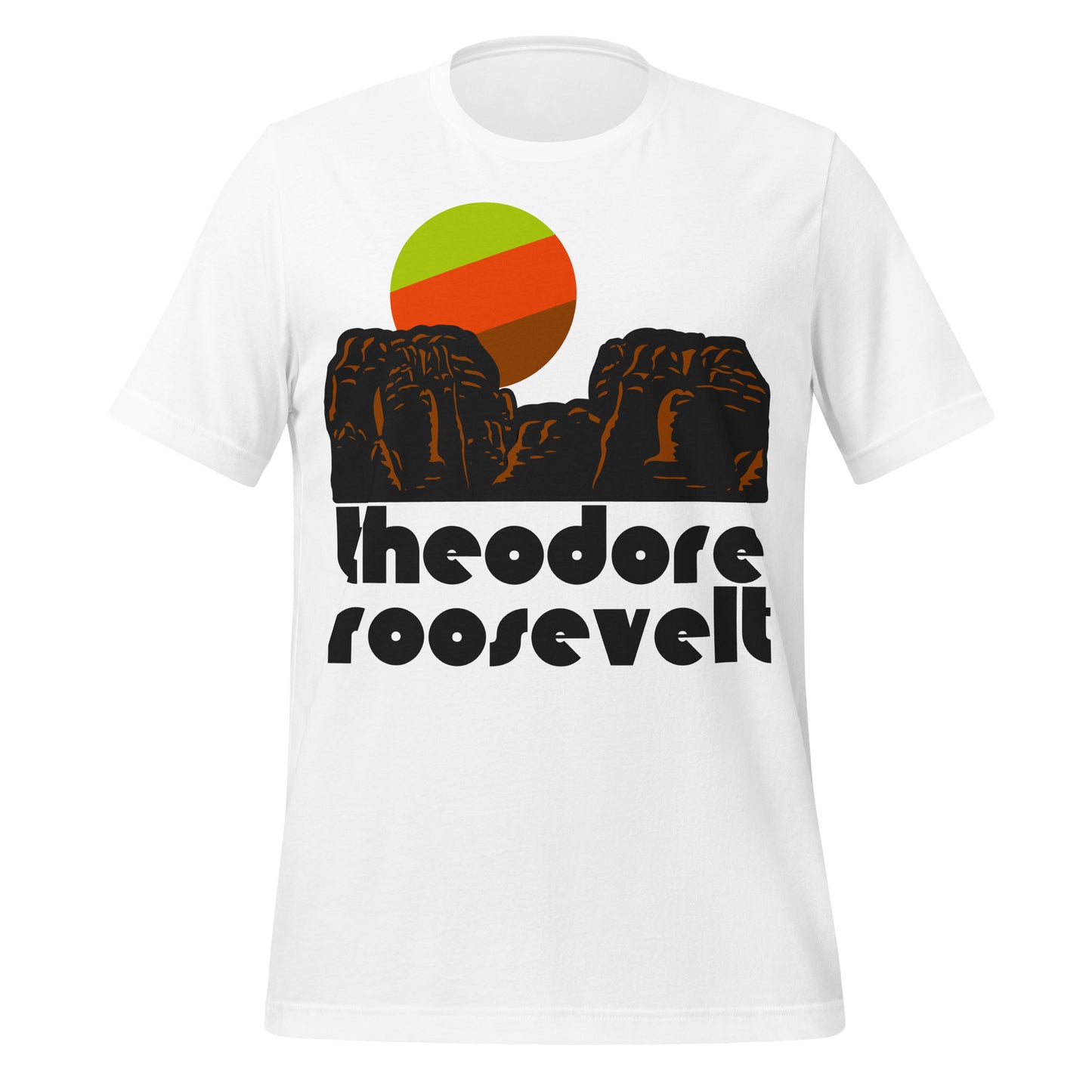 A retro, souvenir white colored short sleeved t-shirt that says "Theodore Roosevelt" referencing the Theodore Roosevelt National Park in Medora, North Dakota, at the intersection of the Badlands and Great Plains. The shirt includes a rocky landscape image and a green, red, and brown sun behind.