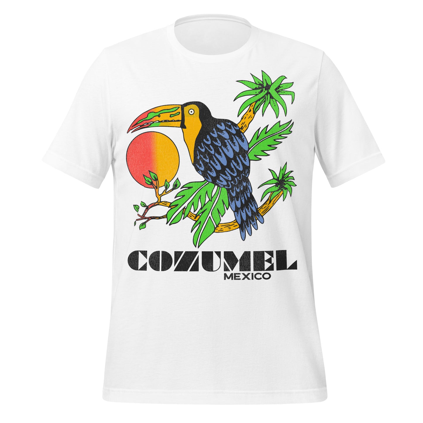 A white t-shirt that says "Cozumel Mexico" with the image of a black and blue toucan bird with a green, red, and yellow beak, a bright sun, and palm tree branches.