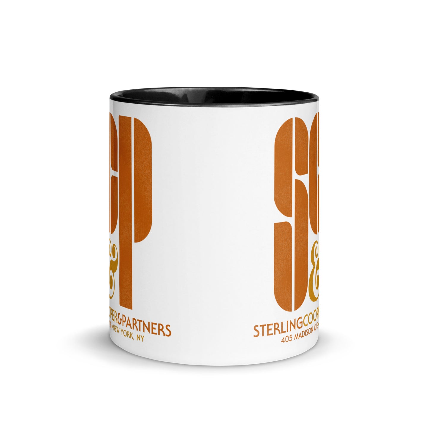 A white ceramic souvenir mug with a black inside and a black handle for tea and coffee. The mug says SCP & Sterling Cooper & Partners in orange letters. Address is 405 Madison Ave + New York, NY.