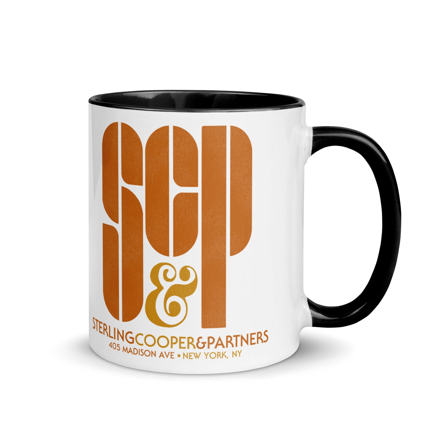 A white, black, and orange ceramic retro coffee mug that says SCP & Sterling Cooper & Partners, referencing the advertising agency in the 1960's television series Mad Men. The address is 405 Madison Ave + New York, NY.
