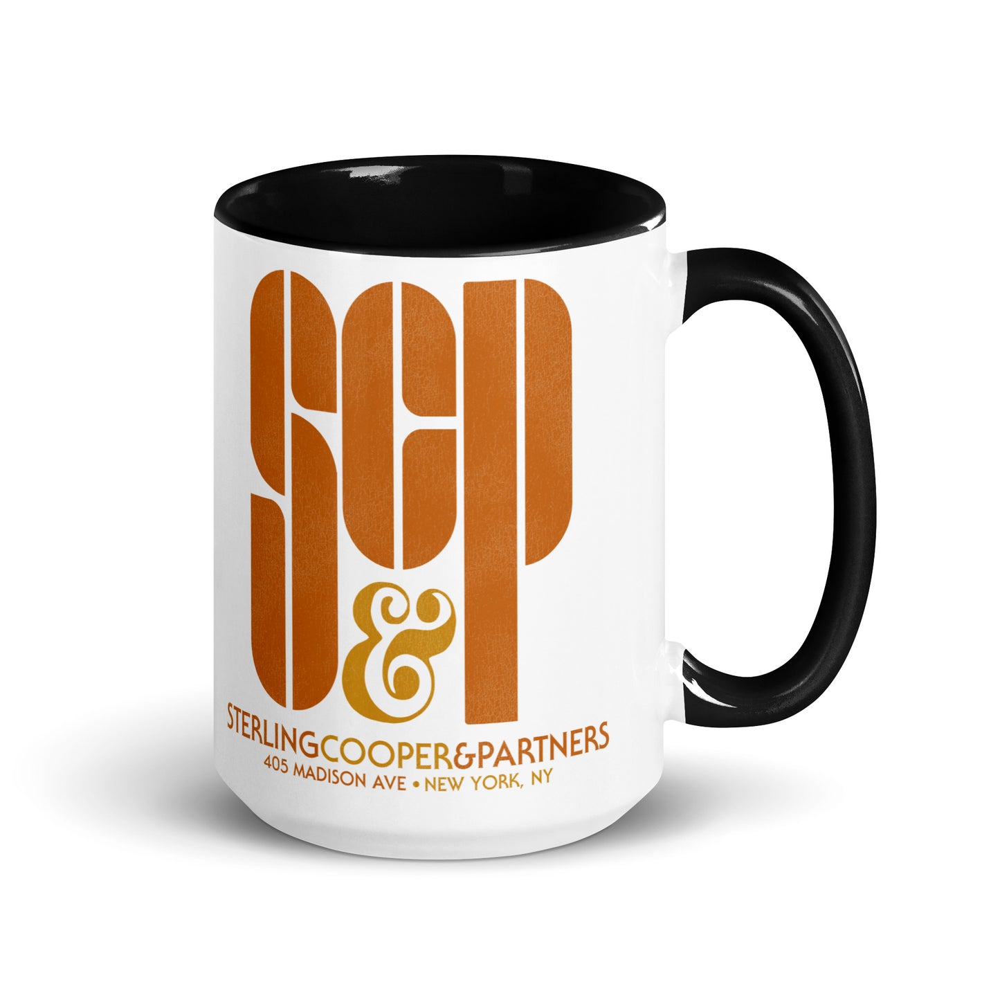 A touristy souvenir white coffee mug with black accents with the SCP advertising agency logo from the television show Mad Men. The mug says "Sterling Cooper & Partners" and "405 Madison Ave + New York, NY."