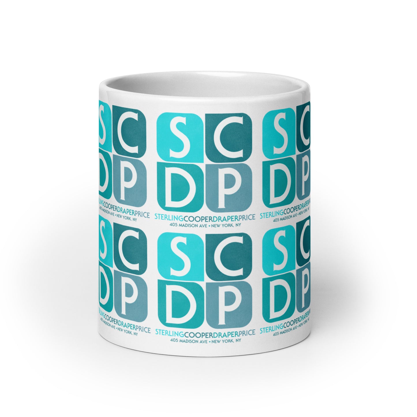 A retro white glossy mug that says "Sterling Cooper Draper Price" and the address "405 Madison Ave + New York, NY". Has four block letters, SCDP, in shades of blue.