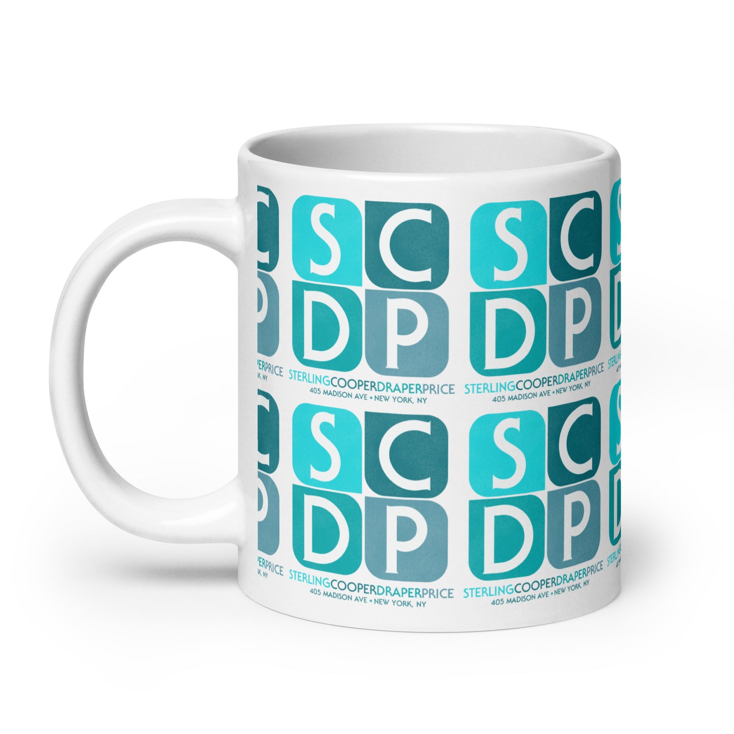 A souvenir white mug from the side that says "Sterling Cooper Draper Price" and includes "405 Madison Ave + New York, NY". Has the letters SCDP in blocks.