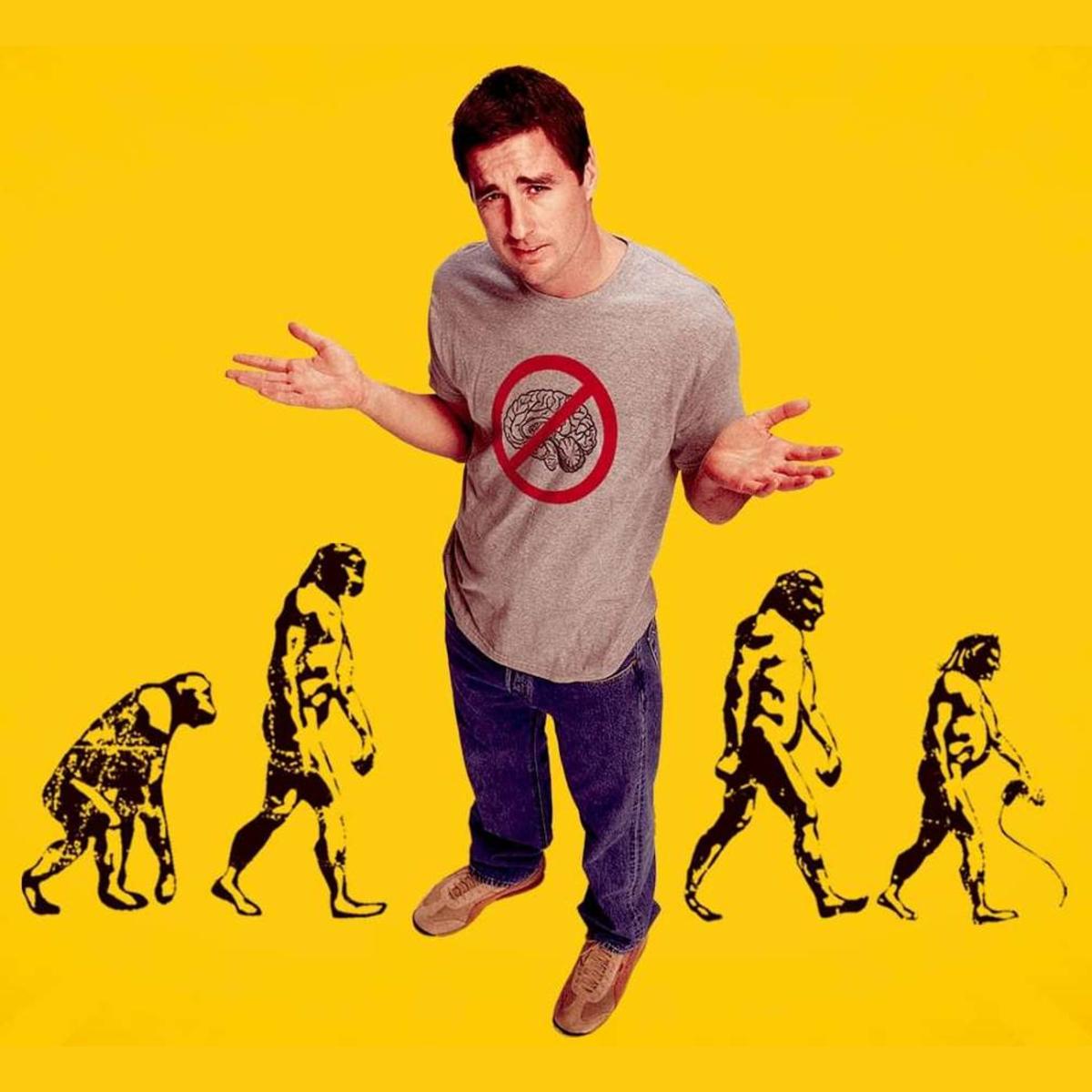 A man wearing a gray t-shirt with a red "no brain" symbol stands in front of a yellow background with four black silhouettes of human figures walking in a line.