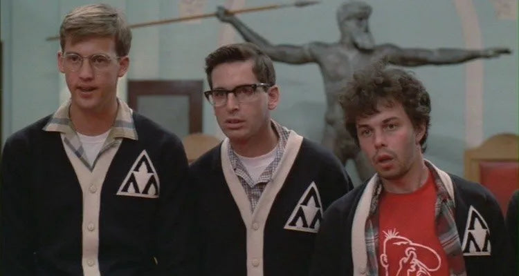 a group of young men standing next to each other