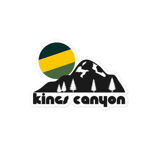 A retro Kings Canyon kiss cut sticker with an image of a mountain with some snow on its sides and beautiful trees and a setting tricolored green and yellow sun. References California's Kings Canyon National Park, home to the famous Redwood Canyon, the largest area of sequoia trees on earth. 