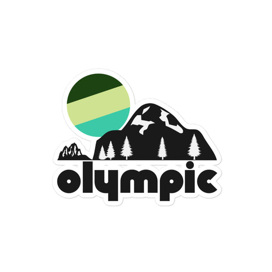 A vintage kiss cut sticker that says 'Olympic', referencing Olympic National Park, underneath the image of a large mountain and multiple pine trees, a green and blue sun falling behind the peaks. 