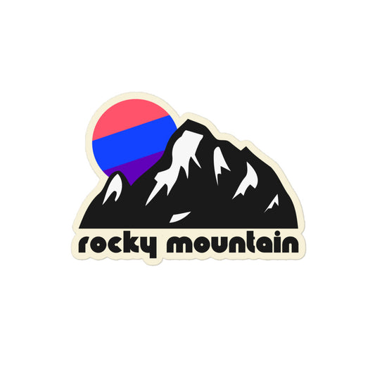 A vintage kiss cut sticker that says "Rocky Mountain" underneath the image of multiple enormous mountains, snow on their sides, as a pink, blue, and purple sun sets behind the peaks. References Rocky Mountain National Park in Colorado. 