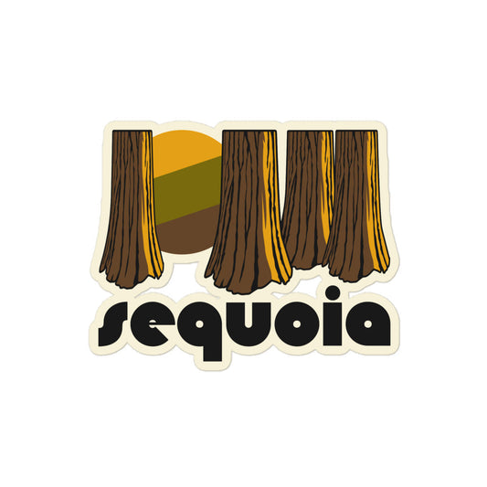  A retro Sequoia kiss cut sticker including an image of a striped yellow, green, and brown sun in between stunning, tall and large brown tree trunks. 