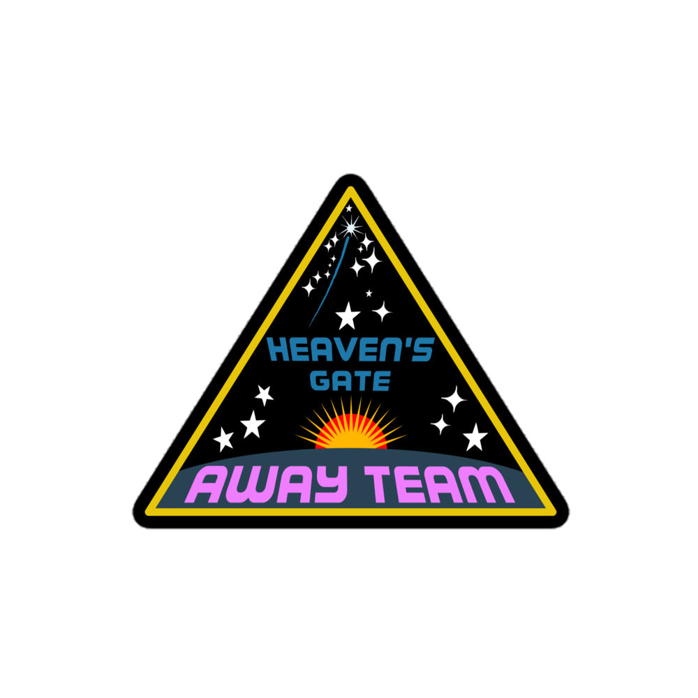 A triangular retro kiss cut sticker that says "Heaven's Gate", referencing a cult, and "Away Team" with the image of a shining sun against black space with stars. 